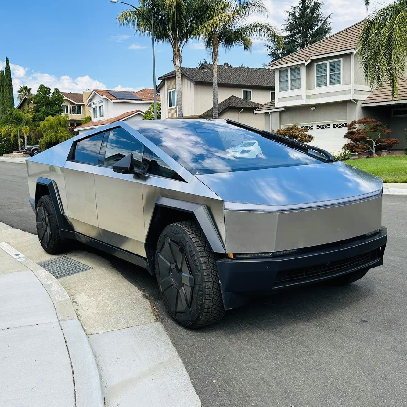 Tesla Cybertruck Cybertruck parked on street in residential neighborhood [9/9 pics] 1694414349548