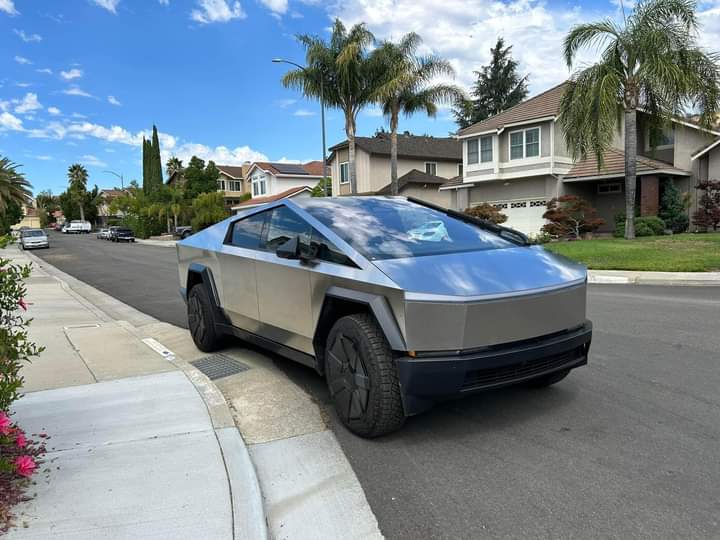 Tesla Cybertruck Cybertruck parked on street in residential neighborhood [9/9 pics] {filename}