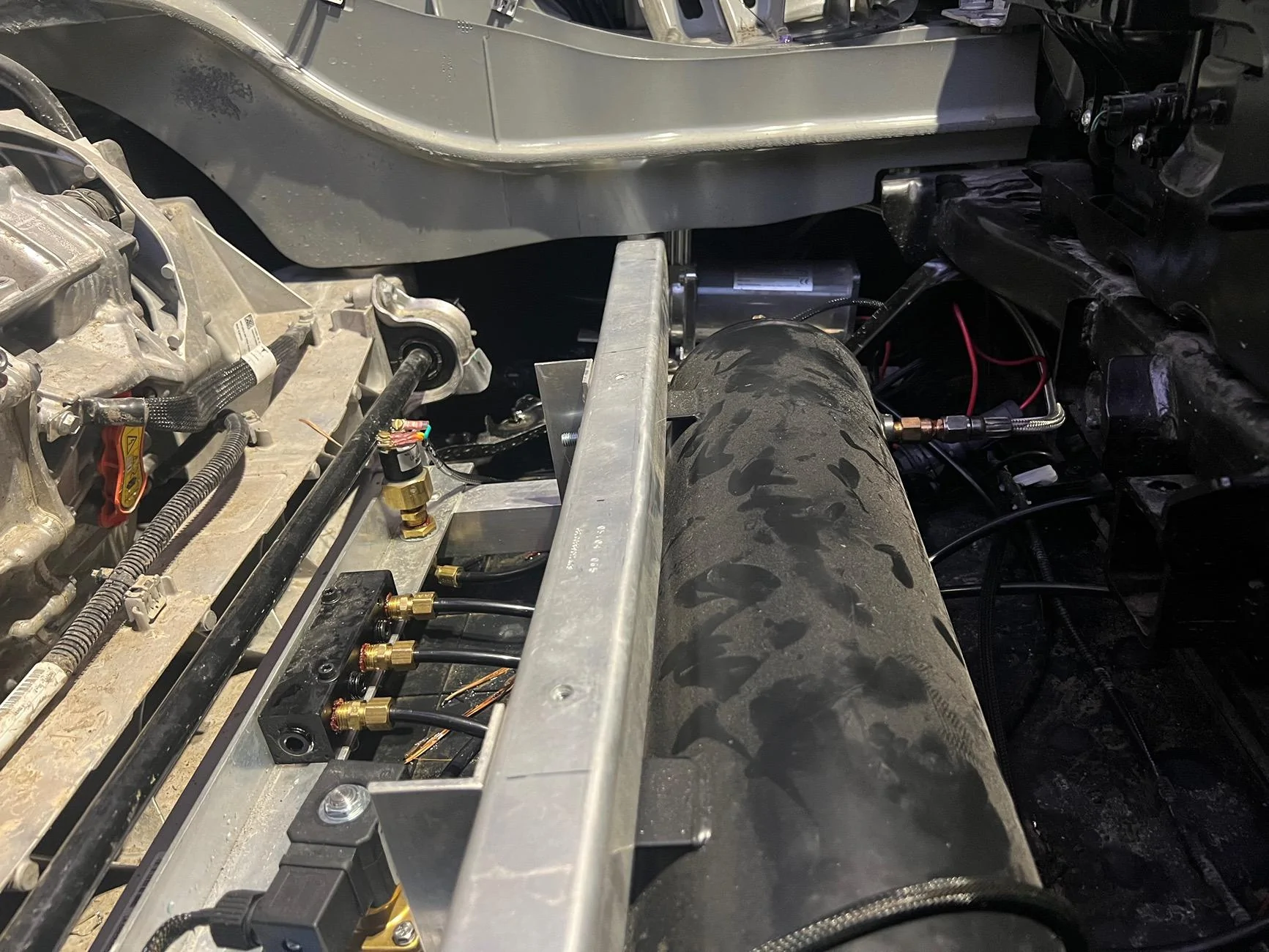 Hidden 200psi air compressor and 2.5gal tank installed under bed vault ...