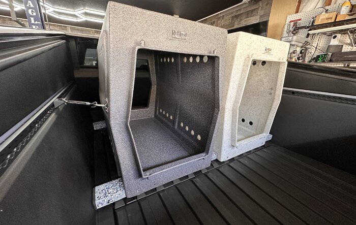 Dog Crates in Bed Vault! Thank you Tesla for building the Cybertruck around them
