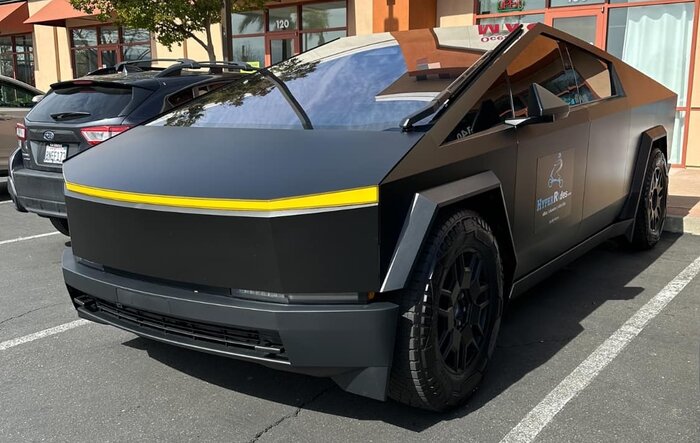 Yellow front lightbar on satin black Cybertruck